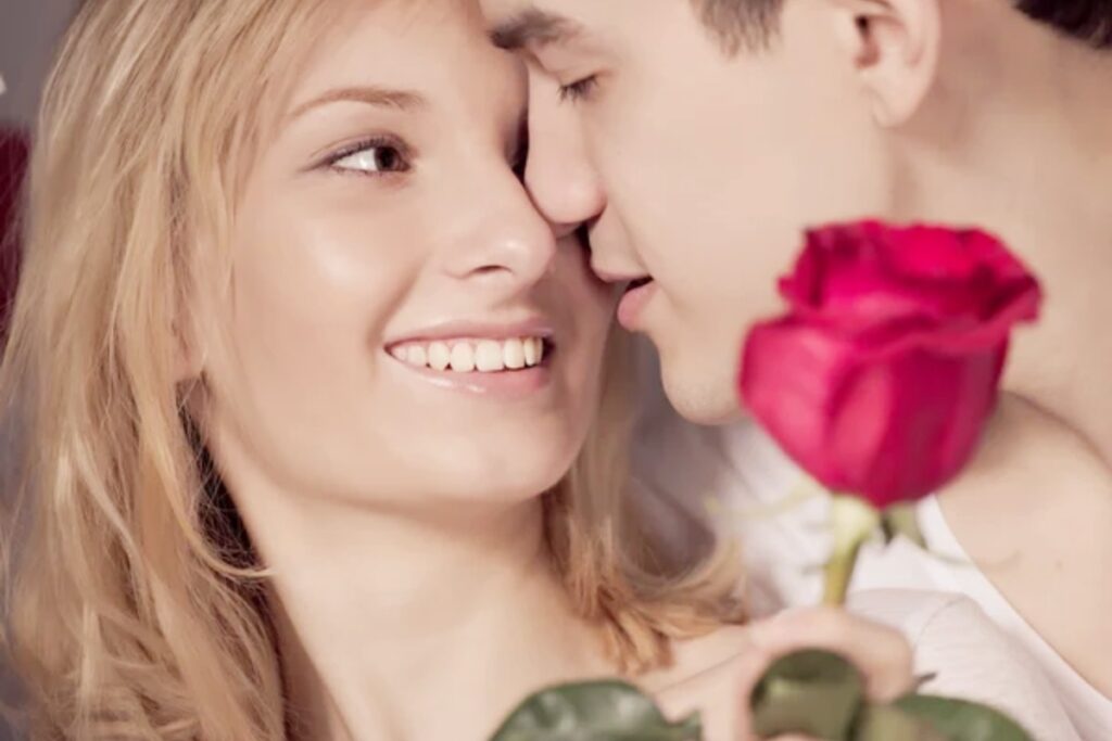 Young couple and roses